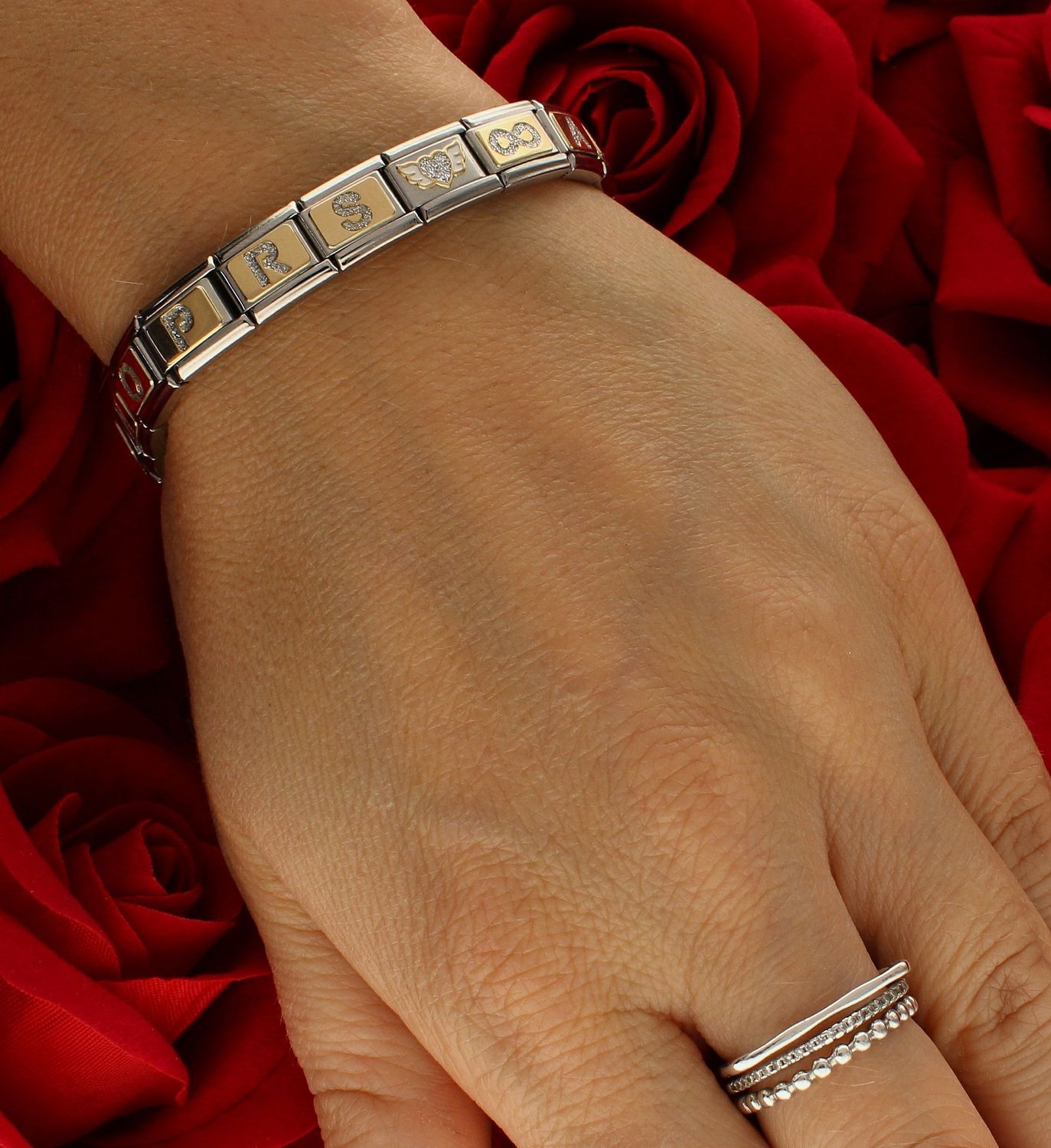 Nomination - Link 18K Skrzydlate brokatowe serce 03022023.png